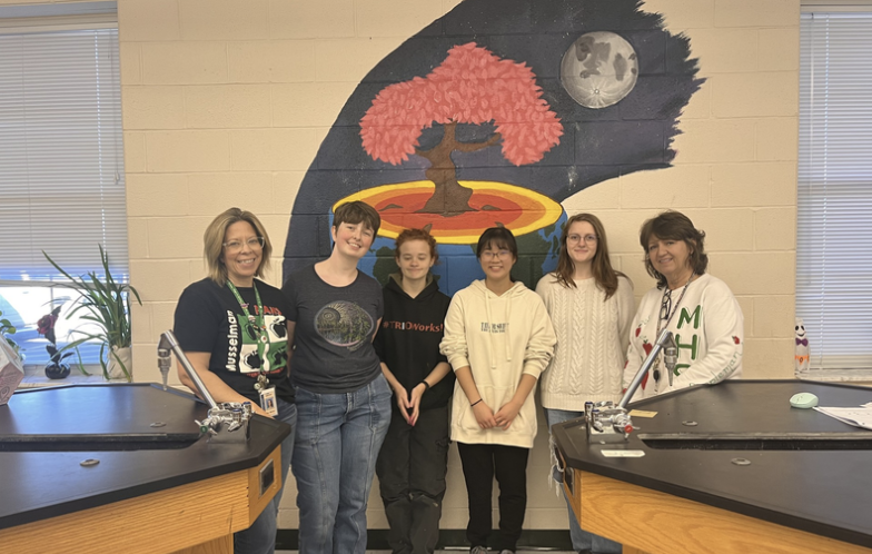 Pictured above is NAHS students and club advisors, Mrs. Burton and Mrs. Shirley, posing in front of one of their many service projects. 